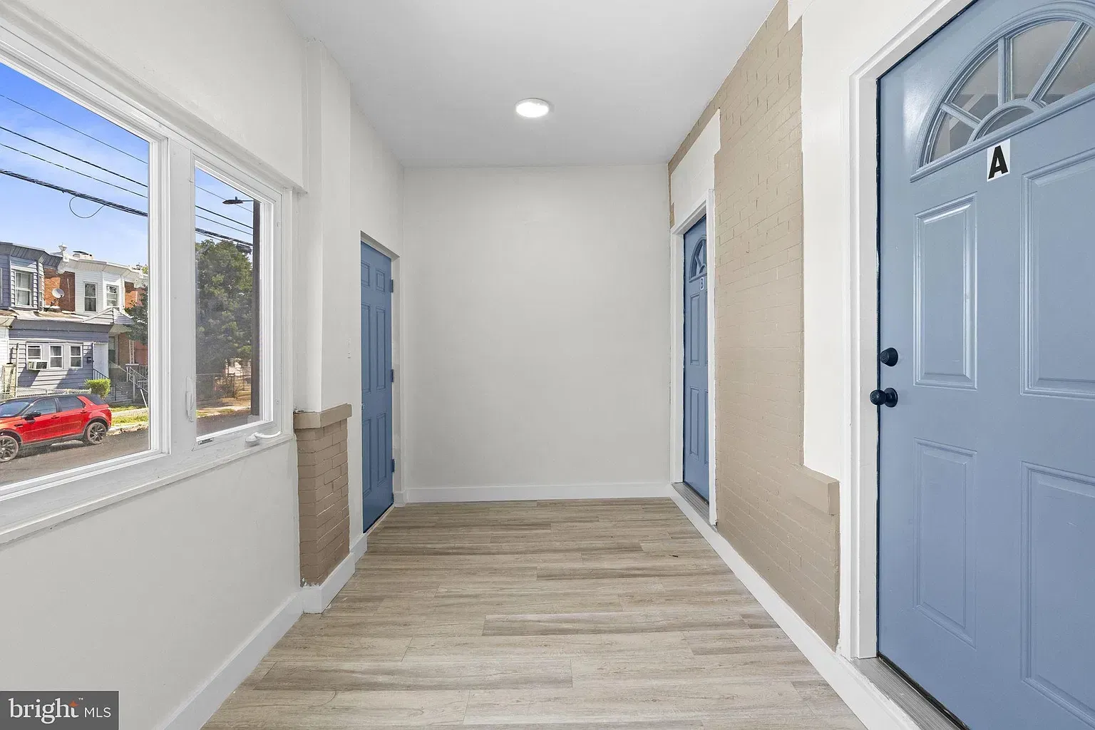 Shared entrance corridor with doors for separate rental units